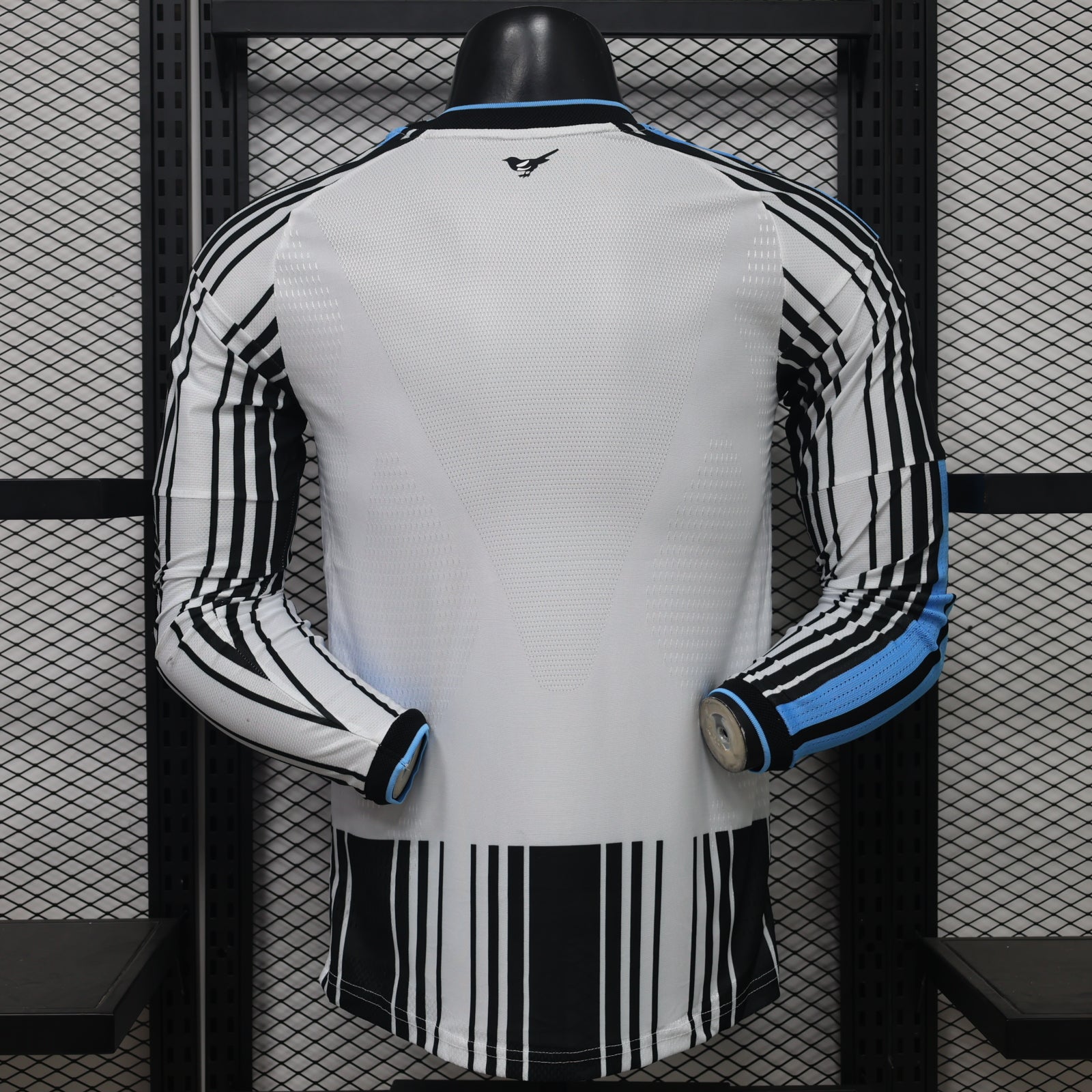 Newcastle home long-sleeve 26/27 back