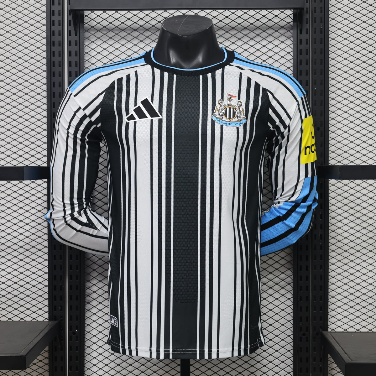 Newcastle home long-sleeve 26/27 front